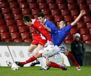 25 November 2006; Paul McAreavey, Linfield, tackles Ryan Dickson, Loughgall. Carnegie Premier League, Linfield v Loughgall, Windsor Park, Belfast. Picture credit: Oliver McVeigh / SPORTSFILE