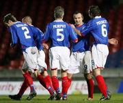 25 November 2006; Glen Ferguson, Linfield, celebrates with William Murphy and Tim Mouncey after scoring his side's fifth goal. Carnegie Premier League, Linfield v Loughgall, Windsor Park, Belfast. Picture credit: Oliver McVeigh / SPORTSFILE