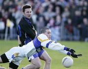 26 November 2006; Damien Neill, Errigal Chiarain, in action against Darren Conway, Ballinderry. AIB Ulster Club Senior Football Championship Semi-Final Replay, Errigal Chiarain v Ballinderry, Casement Park, Belfast, Co. Antrim. Picture credit: Russell Pritchard / SPORTSFILE