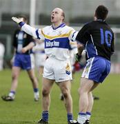 26 November 2006; Peter Canavan, Errigal Chiarain, shouts as a free is given against him for his tackle on Ballinderry's Darren Conway. AIB Ulster Club Senior Football Championship Semi-Final Replay, Errigal Chiarain v Ballinderry, Casement Park, Belfast, Co. Antrim. Picture credit: Russell Pritchard / SPORTSFILE