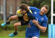 27 August 2014; At the announcement that Bank of Ireland has extended its sponsorship of  Leinster Rugby until end of June 2019 are Leinster's Jamie Heaslip with Louis Lynam, age 11 from Clondalkin RFC. The new five year deal includes exclusive branding of all playing and training kits for the Leinster Rugby professional team and will see Bank of Ireland expand the sponsorship to make a significant additional six figure investment, over five years, to develop the amateur game. The new agreement strengthens Bank of Ireland’s support for Leinster Rugby as it includes support for grass roots level right up to the professional senior team. Clondalkin RFC, Clondalkin, Co. Dublin. Picture credit: David Maher / SPORTSFILE