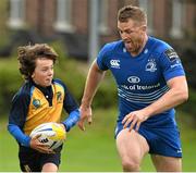 27 August 2014; At the announcement that Bank of Ireland has extended its sponsorship of  Leinster Rugby until end of June 2019 are Leinster's Jamie Heaslip with Louis Lynam, age 11 from Clondalkin RFC. The new five year deal includes exclusive branding of all playing and training kits for the Leinster Rugby professional team and will see Bank of Ireland expand the sponsorship to make a significant additional six figure investment, over five years, to develop the amateur game. The new agreement strengthens Bank of Ireland’s support for Leinster Rugby as it includes support for grass roots level right up to the professional senior team. Clondalkin RFC, Clondalkin, Co. Dublin. Picture credit: David Maher / SPORTSFILE