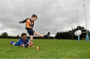 27 August 2014; At the announcement that Bank of Ireland has extended its sponsorship of  Leinster Rugby until end of June 2019 are Leinster's Sean O'Brien, with  Sam Lynan, age 9, from Clondalkin RFC, Dublin. The new five year deal includes exclusive branding of all playing and training kits for the Leinster Rugby professional team and will see Bank of Ireland expand the sponsorship to make a significant additional six figure investment, over five years, to develop the amateur game. The new agreement strengthens Bank of Ireland’s support for Leinster Rugby as it includes support for grass roots level right up to the professional senior team. Clondalkin RFC, Clondalkin, Co. Dublin. Picture credit: Barry Cregg / SPORTSFILE