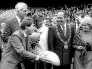 19 November 1988; Dignitaries on the pitch before the game, right to left, US Ambassador to Ireland Margaret Heckler, Lord Mayor of Dublin Ben Briscoe, Norma Smurfit, and Minister of State for Youth and Sport Frank Fahey. Boston College v Army, Emerald Isle Classic, Lansdowne Road, Dublin. Picture credit: Ray McManus / SPORTSFILE
