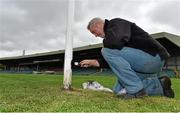 29 August 2014; Groundsman Eugene Griffin, from Limerick City, paints the goalposts ahead of the GAA Football All-Ireland Senior Championship Semi-Final Replay between Kerry and Mayo. Gaelic Grounds, Limerick. Picture credit: Diarmuid Greene / SPORTSFILE