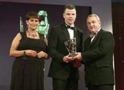 24 November 2006; Ronan Clarke, from Armagh, is presented with his All-Star award by Carolan Lennon, Marketing Director, Vodafone Ireland, and Nickey Brennan, President of the GAA, at the 2006 Vodafone GAA All-Star Awards. Citywest Hotel, Dublin. Picture credit: Brendan Moran / SPORTSFILE