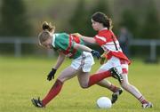 26 November 2006; Claire Egan, Carnacon, in action against Cora Courtney, Donaghmoyne. Vhi Healthcare All-Ireland Ladies Senior Club Championship Final, Donaghmoyne v Carnacon, Pairc Na nGael, Dromard, Co Longford. Picture credit: David Maher / SPORTSFILE