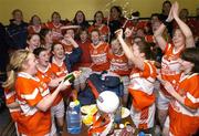 26 November 2006; Members of the Donaghmoyne team celebrate in their dressing room at the end of the game. VHI Healthcare All-Ireland Ladies Senior Club Championship Final, Donaghmoyne v Carnacon, Pairc Na nGael, Dromard, Co Longford. Picture credit: David Maher / SPORTSFILE