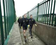 12 November 2006; Johnny Hanratty, left, and Oisin McConville, Crossmaglen Rangers, walk to the dressing room after the warm up. AIB Ulster Senior Football Championship Quarter-Final, Crossmaglen Rangers v Mullahoran, Oliver Plunkett Park, Crossmaglen, Co Armagh. Picture credit: Oliver McVeigh / SPORTSFILE