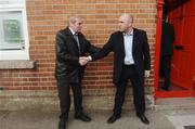 28 November 2006; Jimmy Edwards, left, local undertaker, shakes the hand of Johnny McDonnell, St Patrick's Athletic manager, ahead of the FAI Carlsberg Senior Challenge Cup Final on 3rd December 2006. McDowell's Pub, Inchicore, Dublin. Picture credit: David Maher / SPORTSFILE