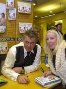 30 November 2006; Golfing Legend Darren Clarke signs a copy of his book 'Heroes All, My Ryder Cup Story 2006' for Caroline Francis from Rotaoth. Eason's Book Store, O'Connell Street, Dublin. Picture credit: Damien Eagers / SPORTSFILE