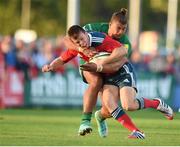 29 August 2014; Johnny Holland, Munster, is tackled by Tom Fowlie, London Irish. SEAT Challenge, Munster v London Irish, RSC, Waterford. Picture credit: Matt Browne / SPORTSFILE