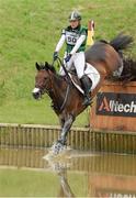 30 August 2014; Camilla Speirs on Portersize Just A Jiff, land in the water as they jump 9B, during the Cross Country Test. 2014 Alltech FEI World Equestrian Games, Caen, France. Picture Credit: Ray McManus / SPORTSFILE