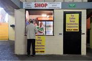 30 August 2014; Carol Casey serves a supporter in her shop ahead of the game. GAA Football All Ireland Senior Championship, Semi-Final Replay, Kerry v Mayo, Gaelic Grounds, Limerick. Picture credit: Barry Cregg / SPORTSFILE