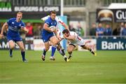 30 August 2014; Jimmy Gopperth, Leinster, with teammate Darragh Fanning in attendance, goes past the tackle of Jared Payne, Ulster. Pre-Season Friendly, Leinster v Ulster. Tallaght Stadium, Tallaght, Co. Dublin. Picture credit: Matt Browne / SPORTSFILE