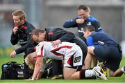 30 August 2014; Ulster's Stuart Olding is treated for an injury before being substituted. Pre-Season Friendly, Leinster v Ulster. Tallaght Stadium, Tallaght, Co. Dublin. Picture credit: Ramsey Cardy / SPORTSFILE