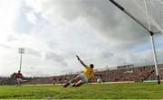 30 August 2014; Cillian O'Connor, Mayo, shoots to score his side's first goal, from a penalty, past Kerry goalkeeper Brian Kelly. GAA Football All Ireland Senior Championship, Semi-Final Replay, Kerry v Mayo. Gaelic Grounds, Limerick. Picture credit: Stephen McCarthy / SPORTSFILE
