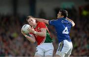 30 August 2014; Cillian O'Connor, Mayo, in action against Shane Enright, Kerry. GAA Football All Ireland Senior Championship, Semi-Final Replay, Kerry v Mayo, Gaelic Grounds, Limerick. Picture credit: Dáire Brennan / SPORTSFILE
