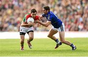 30 August 2014; Kevin McLoughlin, Mayo, in action against Killian Young, Kerry. GAA Football All Ireland Senior Championship, Semi-Final Replay, Kerry v Mayo. Gaelic Grounds, Limerick. Picture credit: Stephen McCarthy / SPORTSFILE