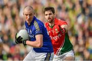 30 August 2014; Kieran Donaghy, Kerry, in action against Ger Cafferkey, Mayo. GAA Football All Ireland Senior Championship, Semi-Final Replay, Kerry v Mayo, Gaelic Grounds, Limerick. Picture credit: Barry Cregg / SPORTSFILE