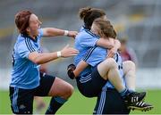 30 August 2014; Lyndsay Peat, Denise Masterson and Lucy Collins Dublin, celebrate at the final whistle. TG4 All-Ireland Ladies Football Senior Championship, Semi-Final, Dublin v Galway, Cusack Park, Mullingar, Co. Westmeath. Picture credit: Oliver McVeigh / SPORTSFILE
