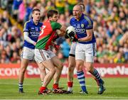 30 August 2014; Kieran Donaghy, Kerry, reacts after winning a free against Ger Cafferkey, left, and Colm Boyle, right, against Colm Boyle, Mayo. GAA Football All Ireland Senior Championship, Semi-Final Replay, Kerry v Mayo, Gaelic Grounds, Limerick. Picture credit: Barry Cregg / SPORTSFILE