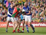 30 August 2014; Kieran Donaghy, Kerry, reacts after winning a free against Ger Cafferkey, left, and Colm Boyle, right, against Colm Boyle, Mayo. GAA Football All Ireland Senior Championship, Semi-Final Replay, Kerry v Mayo, Gaelic Grounds, Limerick. Picture credit: Barry Cregg / SPORTSFILE