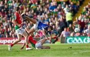 30 August 2014; James O'Donoghue, Kerry, is upended in the box by Mayo's Ger Cafferkey to win a penalty for his team, which he converted for his side's third goal of the game. GAA Football All Ireland Senior Championship, Semi-Final Replay, Kerry v Mayo. Gaelic Grounds, Limerick. Picture credit: Stephen McCarthy / SPORTSFILE