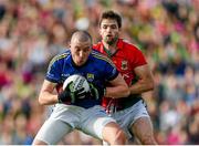 30 August 2014; Kieran Donaghy, Kerry, in action against Ger Cafferkey, Mayo. GAA Football All Ireland Senior Championship, Semi-Final Replay, Kerry v Mayo. Gaelic Grounds, Limerick. Picture credit: Stephen McCarthy / SPORTSFILE