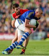 30 August 2014; Kieran Donaghy, Kerry, in action against Ger Cafferkey, Mayo. GAA Football All Ireland Senior Championship, Semi-Final Replay, Kerry v Mayo. Gaelic Grounds, Limerick. Picture credit: Stephen McCarthy / SPORTSFILE