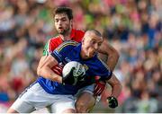 30 August 2014; Kieran Donaghy, Kerry, in action against Ger Cafferkey, Mayo. GAA Football All Ireland Senior Championship, Semi-Final Replay, Kerry v Mayo. Gaelic Grounds, Limerick. Picture credit: Stephen McCarthy / SPORTSFILE