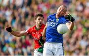 30 August 2014; Kieran Donaghy, Kerry, in action against Ger Cafferkey, Mayo. GAA Football All Ireland Senior Championship, Semi-Final Replay, Kerry v Mayo. Gaelic Grounds, Limerick. Picture credit: Stephen McCarthy / SPORTSFILE