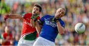 30 August 2014; Kieran Donaghy, Kerry, in action against Ger Cafferkey, Mayo. GAA Football All Ireland Senior Championship, Semi-Final Replay, Kerry v Mayo. Gaelic Grounds, Limerick. Picture credit: Stephen McCarthy / SPORTSFILE