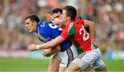 30 August 2014; David Moran, Kerry, in action against Jason Doherty, second from right, and Cillian O'Connor, Mayo. GAA Football All Ireland Senior Championship, Semi-Final Replay, Kerry v Mayo, Gaelic Grounds, Limerick. Picture credit: Barry Cregg / SPORTSFILE
