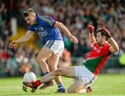 30 August 2014; Ger Cafferkey, Mayo, fouls James O'Donoghue, Kerry, which resulted in Kerry's second penalty. GAA Football All Ireland Senior Championship, Semi-Final Replay, Kerry v Mayo, Gaelic Grounds, Limerick. Picture credit: Dáire Brennan / SPORTSFILE