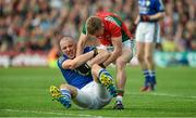 30 August 2014; Kieran Donaghy, Kerry, fails to release the ball after a free was awarded against him, as Kevin Keane, Mayo tries to take it off him. GAA Football All Ireland Senior Championship, Semi-Final Replay, Kerry v Mayo, Gaelic Grounds, Limerick. Picture credit: Barry Cregg / SPORTSFILE