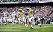 30 August 2014; Justin Holman, #13, University of Central Florida, celebrates after scoring a touchdown for his side during the 4th quarter of the game. Croke Park Classic 2014, Penn State v University of Central Florida. Croke Park, Dublin. Picture credit: Brendan Moran / SPORTSFILE