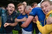 30 August 2014; Kerry's Kieran Donaghy, right, and James O'Donoghue celebrate with fans after the final whistle. GAA Football All Ireland Senior Championship, Semi-Final Replay, Kerry v Mayo. Gaelic Grounds, Limerick. Picture credit: Stephen McCarthy / SPORTSFILE