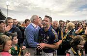 30 August 2014; Marc O Sé, Kerry, celebrates with former Kerry County Board Chairman Seán Walsh after the game. GAA Football All Ireland Senior Championship, Semi-Final Replay, Kerry v Mayo, Gaelic Grounds, Limerick. Picture credit: Dáire Brennan / SPORTSFILE