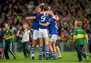 30 August 2014; Kerry players, from left to right, Declan O'Sullivan, David Moran, Killian Young and Barry John Keane celebrate after victory over Mayo. GAA Football All Ireland Senior Championship, Semi-Final Replay, Kerry v Mayo. Gaelic Grounds, Limerick. Picture credit: Diarmuid Greene / SPORTSFILE