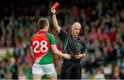 30 August 2014; Referee Cormac Reilly shows a red card to Cillian O'Connor, Mayo. GAA Football All Ireland Senior Championship, Semi-Final Replay, Kerry v Mayo. Gaelic Grounds, Limerick. Picture credit: Diarmuid Greene / SPORTSFILE