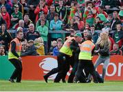 30 August 2014; A disgruntled Mayo supporter is restrained as he tries to confront referee Cormac Reilly during the closing stages of the game. GAA Football All Ireland Senior Championship, Semi-Final Replay, Kerry v Mayo, Gaelic Grounds, Limerick. Picture credit: Dáire Brennan / SPORTSFILE