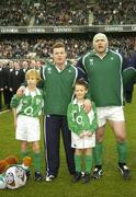 26 November 2006; Mascots Stuart Murless, left, and Jack Jacob with Ireland captain Brian O'Driscoll and John Hayes before the game. Autumn Internationals, Ireland v The Pacific Islands, Lansdowne Road, Dublin. Picture credit: Brendan Moran / SPORTSFILE