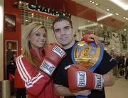 28 November 2006; EBU Super Bantamweight Champion Bernard Dunne with model Ruth O'Neill on a visit to Champion Sports to launch its Christmas range. Champion Sports, Jervis Street Centre, Dublin. Picture credit: Brian Lawless / SPORTSFILE
