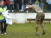 26 March 2006; Derek McCormack, Kildare, prepares to have his jersey changed during the second half. Allianz National Football League, Division 1B, Round 6, Kildare v Wexford, St. Conleth's Park, Newbridge, Co. Kildare. Picture credit: David Maher / SPORTSFILE