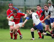 2 December 2006; Kevin Flanagan, UL Bohemian, is tackled by Darragh Lyons, Cork Constitution. AIB League, Division 1, UL Bohemian v Cork Constitution, Thomond Park, Limerick. Picture credit: Kieran Clancy / SPORTSFILE
