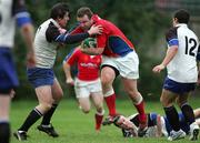 2 December 2006; James O'Neill, UL Bohemian, is tackled by Brendan Cuttriss (left) and David O'Leary (12), Cork Constitution. AIB League, Division 1, UL Bohemian v Cork Constitution, Thomond Park, Limerick. Picture credit: Kieran Clancy / SPORTSFILE