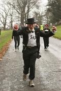 3 December 2006; James Hempsey from Clondalkin, Dublin, in action during the Jingle Bells 5K, Phoenix Park, Dublin. Picture credit: Tomas Greally / SPORTSFILE