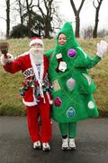 3 December 2006; Brian Tyrrell from Poppintree in Dublin, left, and Dee Wynter from Swords Co.Dublin. Jingle Bells 5K, Phoenix Park, Dublin. Picture credit: Tomas Greally / SPORTSFILE