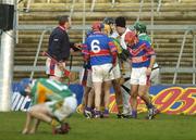 3 December 2006; Erin's Own players confront an umpire in injury time at the end of the game. AIB Munster Senior Club Hurling Championship Final, Toomevara v Erin's Own, Gaelic Grounds, Limerick. Picture credit: Brendan Moran / SPORTSFILE